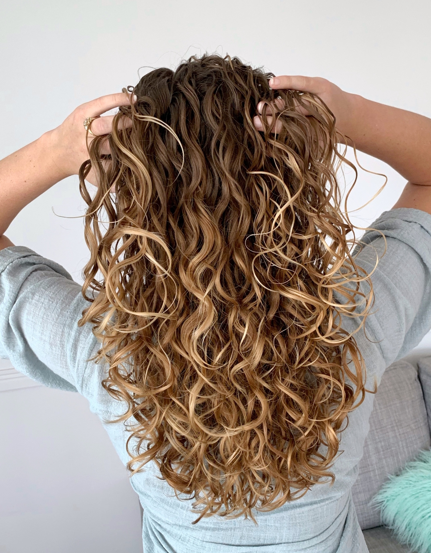 The Best Hairstyles for Long Curly Hair  The Skincare Edit